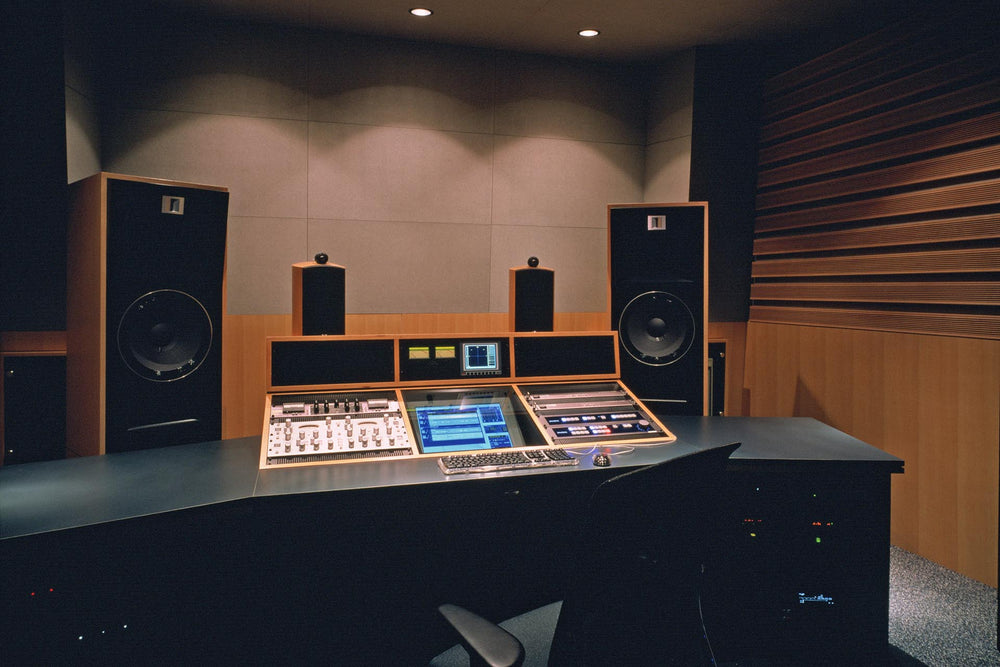 Wide interior view of a world-class mastering suite at Sony Music Studios Tokyo, highlighting custom STRAUSS ELEKTROAKUSTIK SE-MF-2.0 mastering monitors alongside a precision analog console and outboard gear under warm studio lighting.