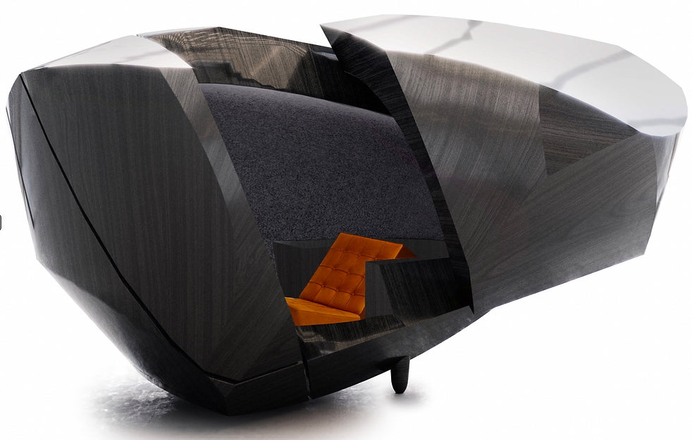 Studio view of the STRAUSS ELEKTROAKUSTIK OPC (Original Presentation Capsule) at SE MUSICLAB in Bern, Switzerland, showcasing the futuristic, carbon-textured physical acoustic shell structure enclosing an optimized listening space and integrated orange leather studio chair set against a clean white background.