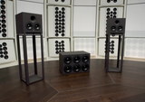 Front angle view of the STRAUSS ELEKTROAKUSTIK AP Series monitoring systems, showcasing the SE AP-1 and SE AP-SW subwoofer grouped together in THE LAB at the SE MUSICLAB.